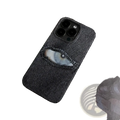 Dark denim textured phone case with stitched eye design featuring silver iris and black pupil on back side