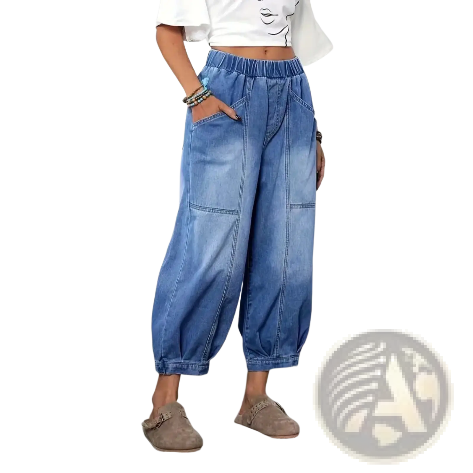 Light-wash denim capri pants with wide legs elastic waistband and two large patch pockets in a retro high waisted style