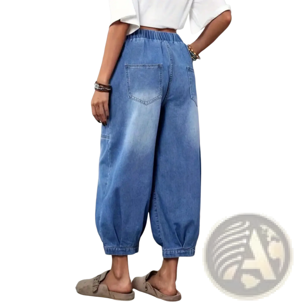Light-wash blue denim capri pants with elastic waistband cuffed hems high waisted retro style