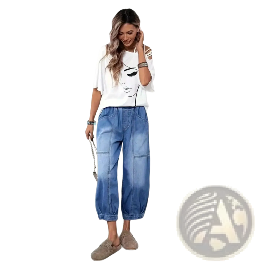 Blue denim capri pants with relaxed fit high waisted elastic waistband in retro light wash style