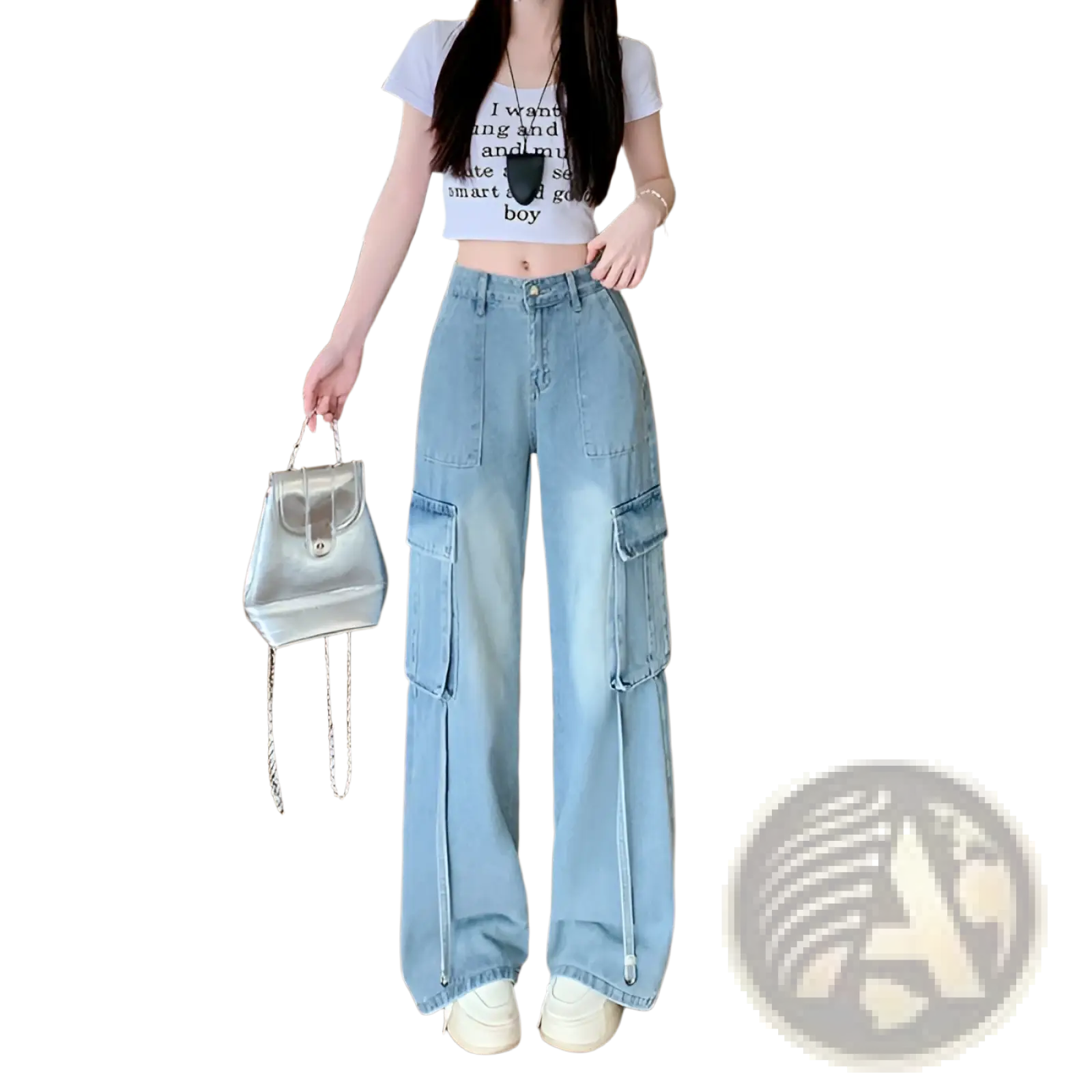 Silver metallic mini backpack with chain strap paired with denim cargo pants wide leg light wash front view