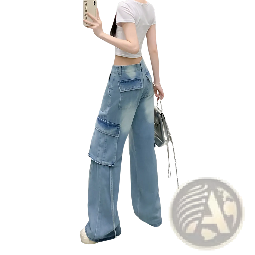 Light-wash denim cargo pants with wide legs and multiple pockets made from durable denim fabric