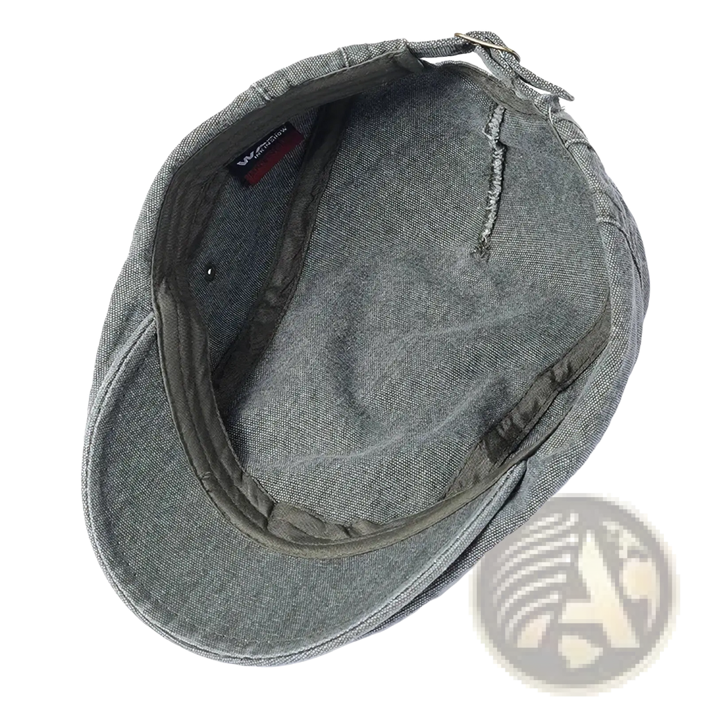 Olive green denim flat cap with stitched interior and adjustable strap vintage beret style hat shown from the back side