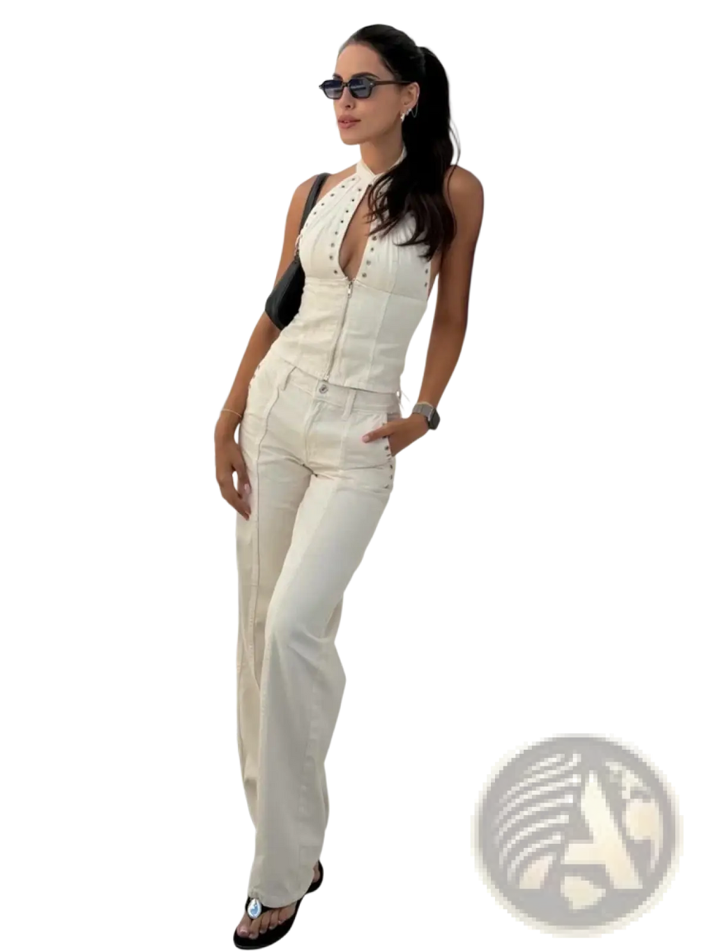 Cream-colored denim halter crop top and wide leg pant set with front zipper and silver stud accents on the collar