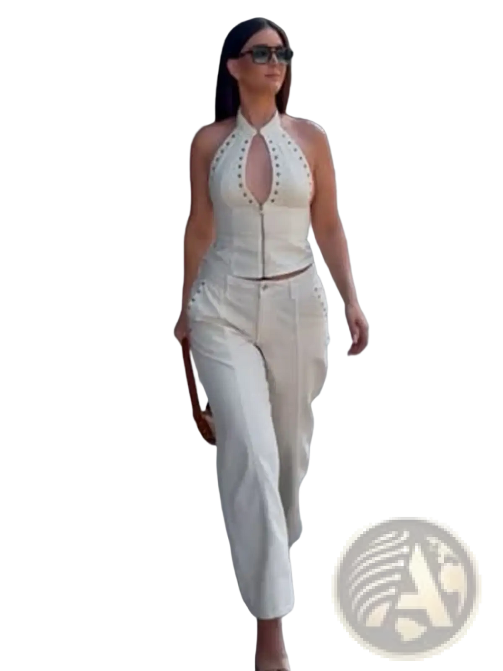 White denim halter crop top with studded details and front zipper paired with matching wide leg trousers