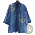 A blue denim kimono cardigan for men featuring intricate white and gold dandelion embroidery on the front