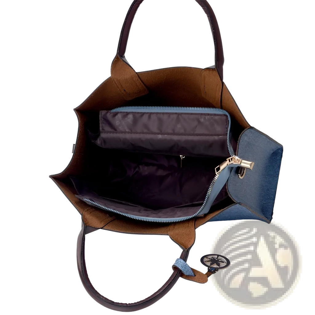 Denim and leather three piece multi compartment handbag set featuring a brown and blue two-tone tote with leather handles and a compass charm