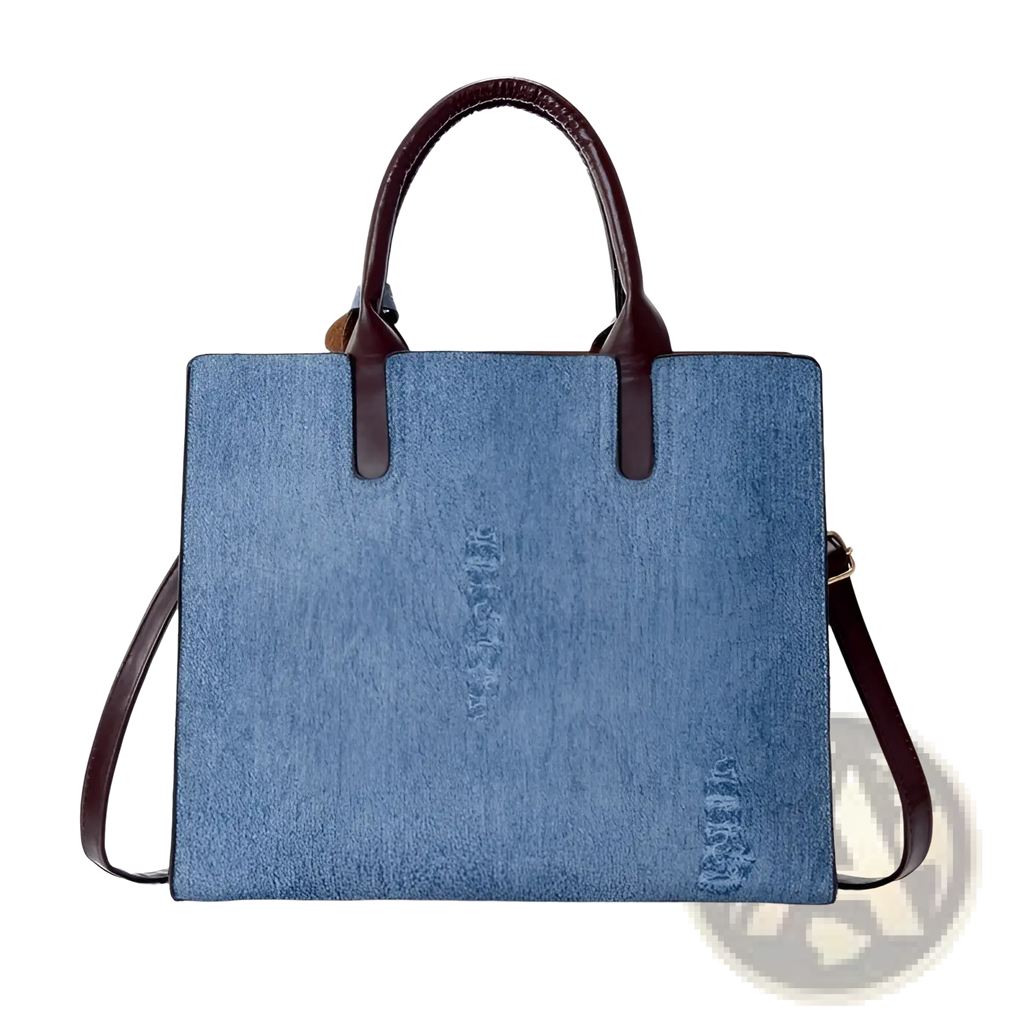 Blue denim tote bag with brown leather handles and shoulder strap from denim and leather three piece multi compartment handbag set