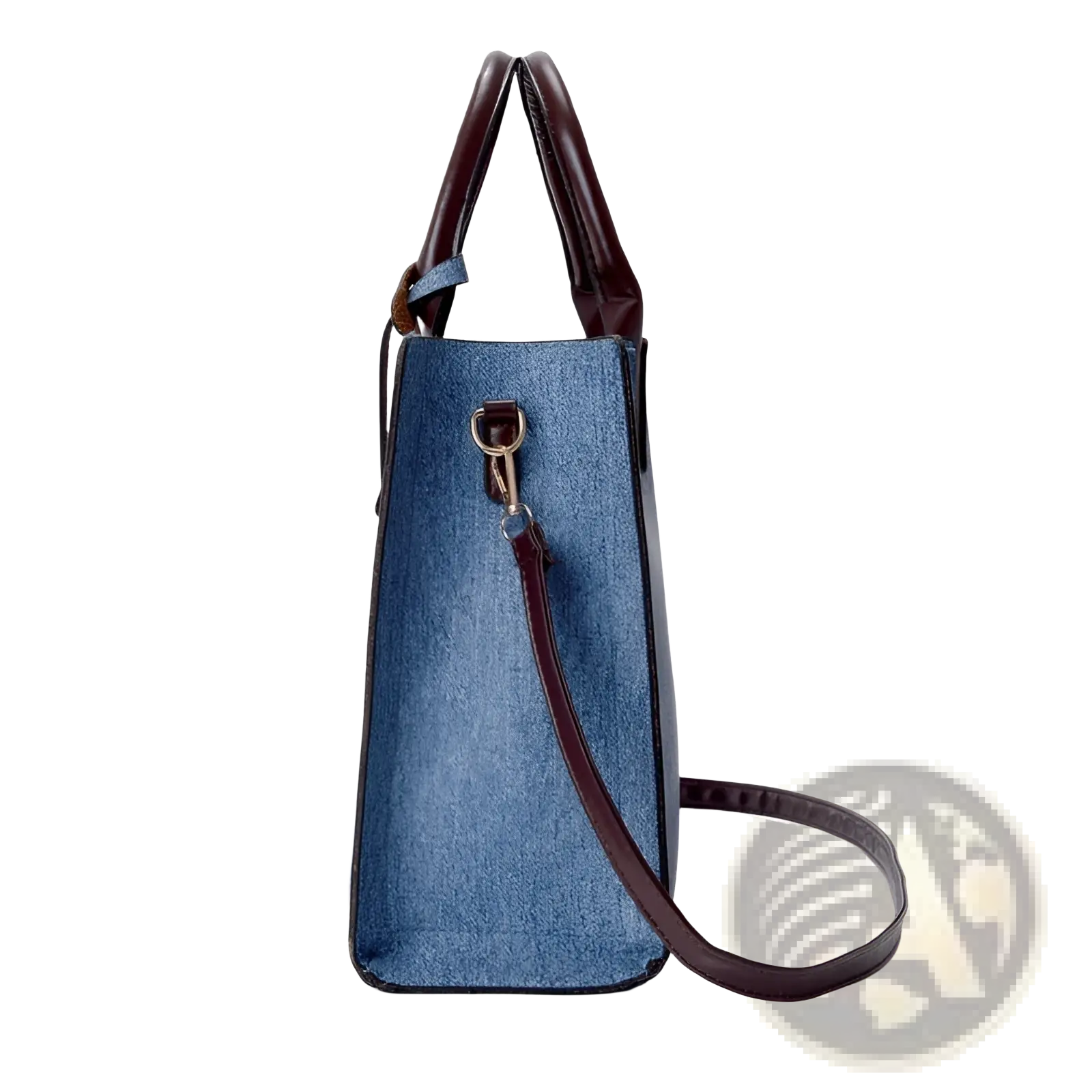Denim and leather three piece handbag set featuring a denim blue bag with brown leather handles and strap