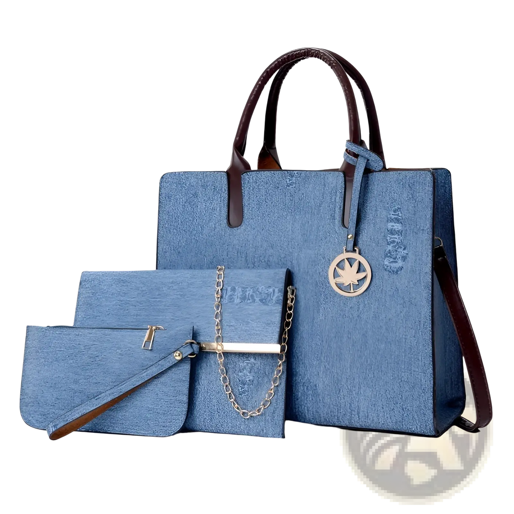Blue denim handbag with brown leather handles and gold-tone leaf charm from denim and leather multi compartment set
