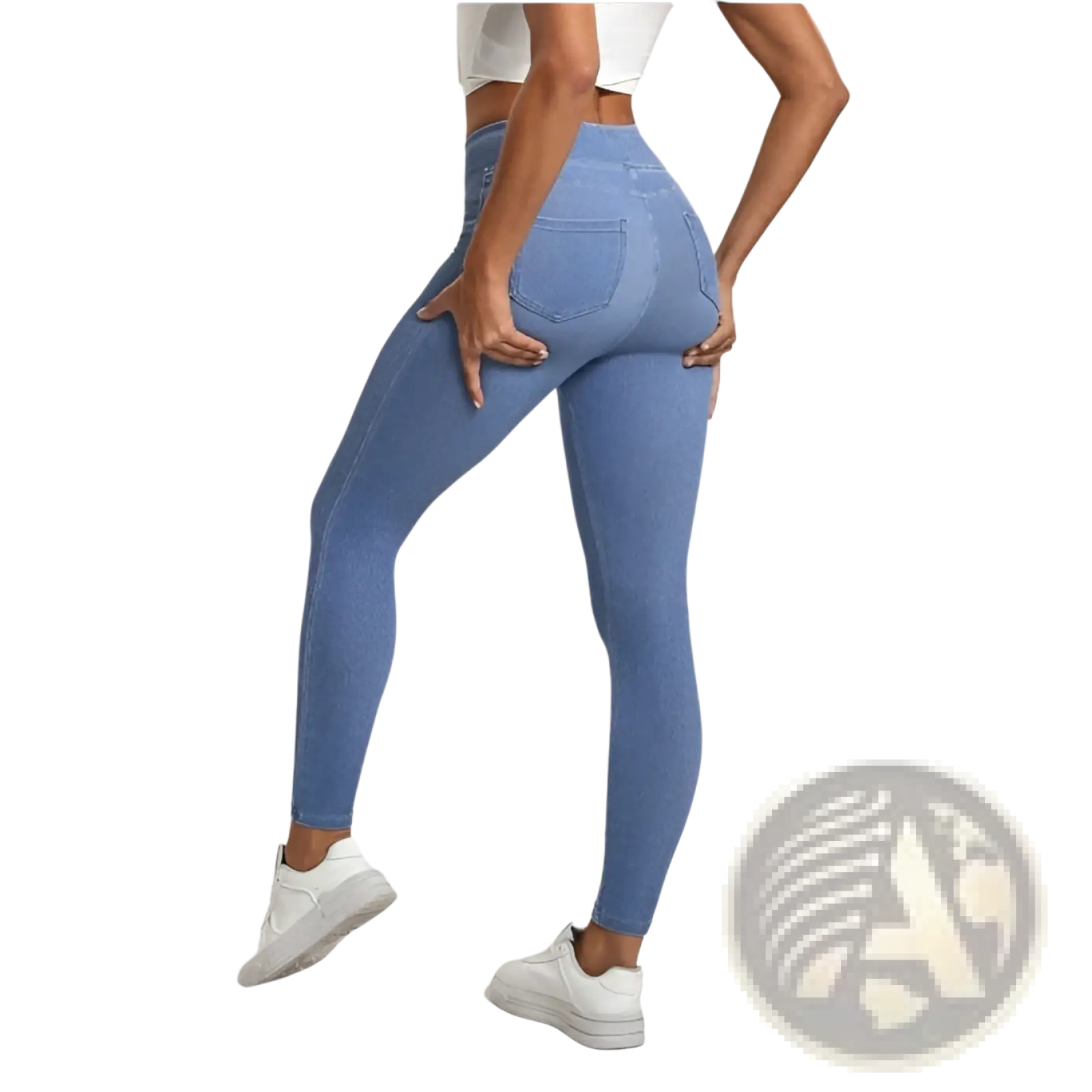 Light blue high-waisted denim leggings with a snug fit and back pockets shown from the back side
