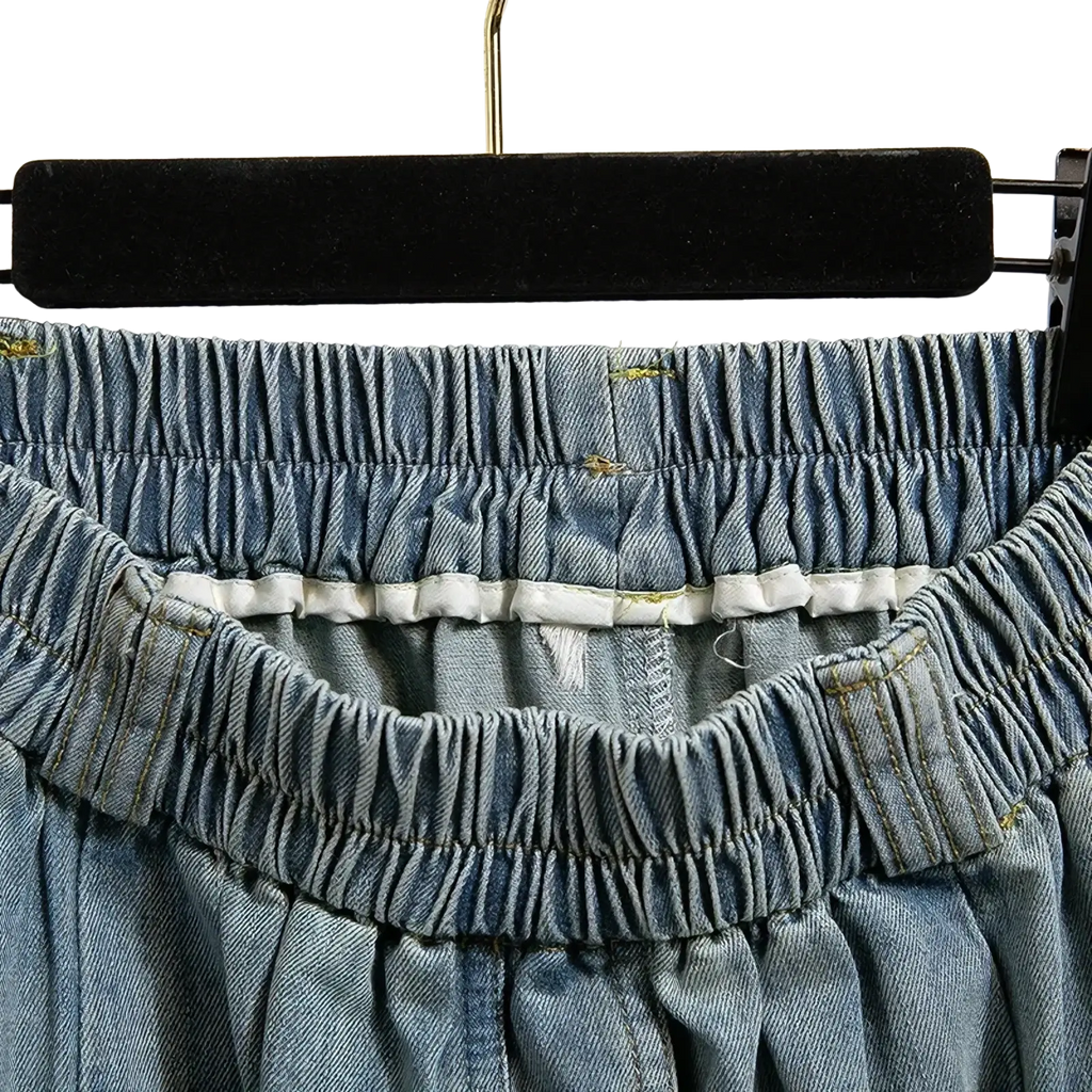 Denim a-line midi skirt in light-wash denim with elastic waistband and gathered ruched design front view