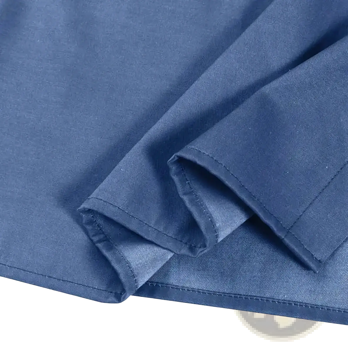 Denim maxi dress button down ruffle hem casual in soft medium blue cotton fabric with neat seams and subtle texture