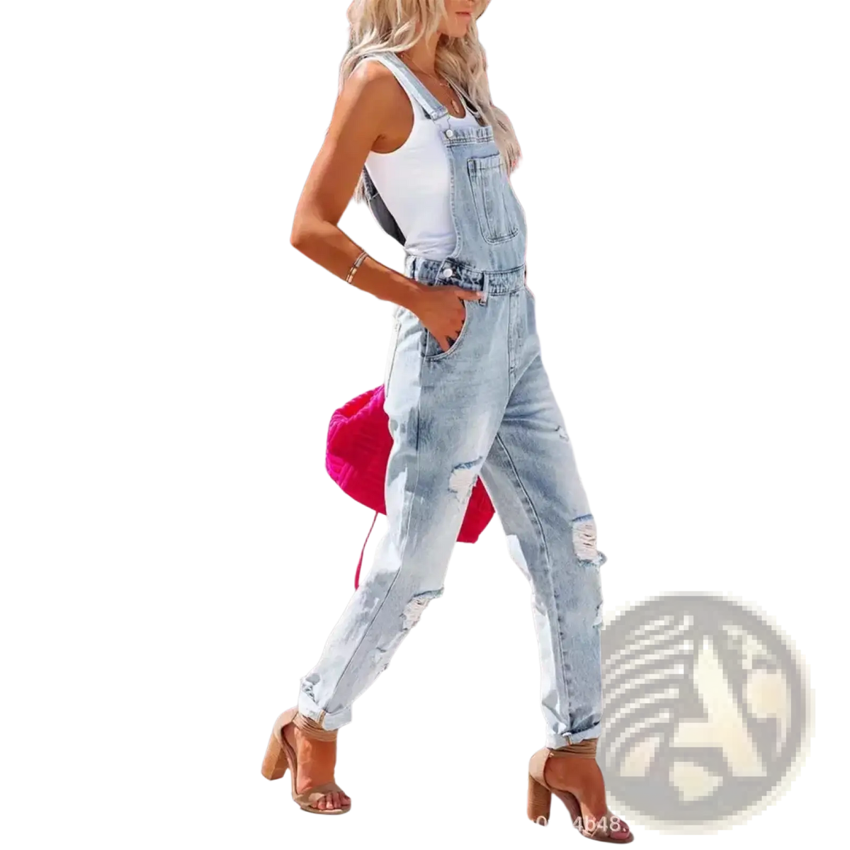 Denim overalls ripped light wash jumpsuit made of light-wash denim with distressed details and rolled cuffs