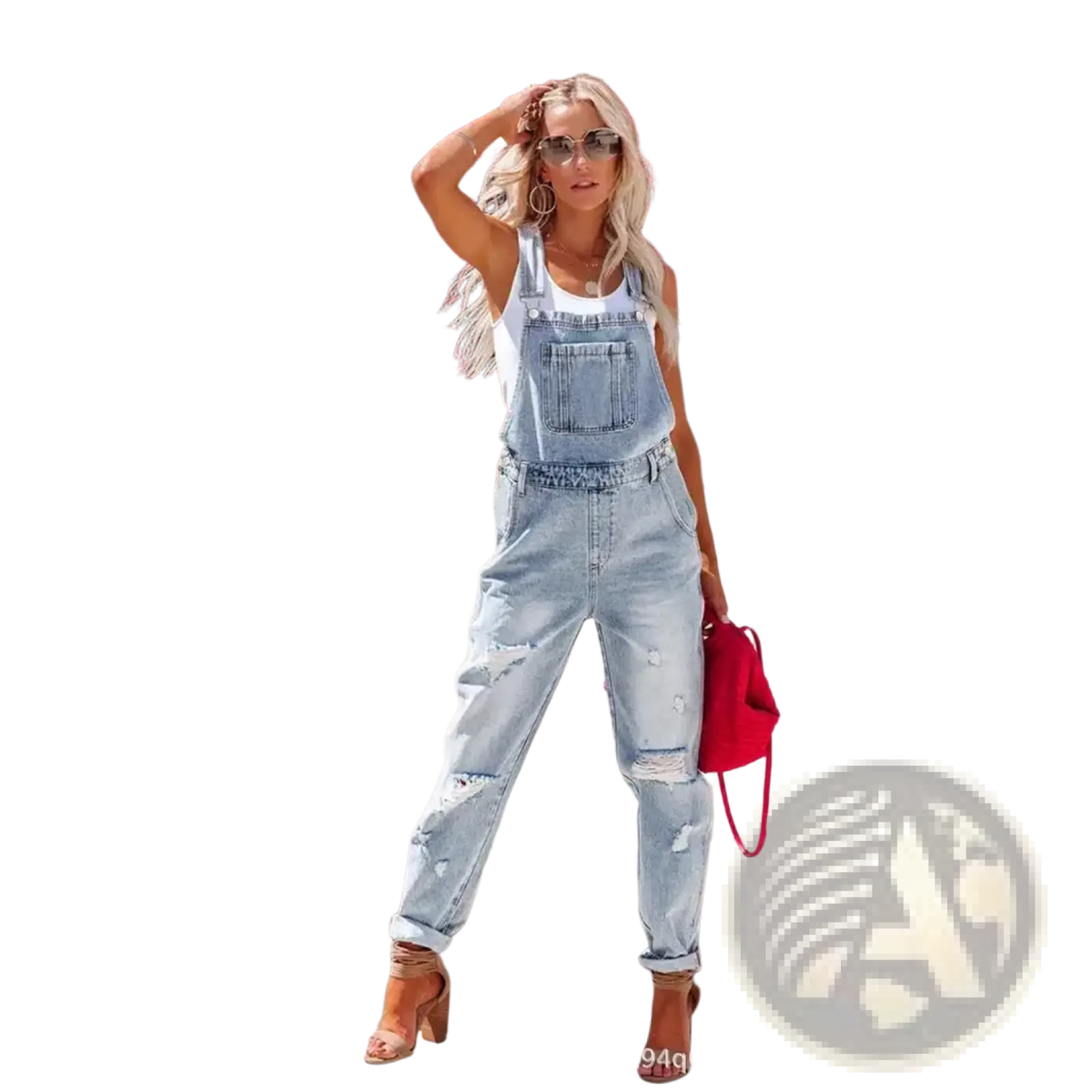Light-wash denim overalls with ripped details and rolled cuffs in a casual jumpsuit style for everyday wear