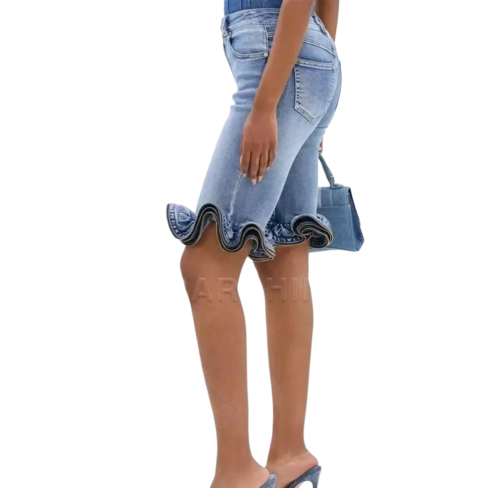 Denim ruffle hem shorts in dark blue featuring light-wash material with flared layered fabric detailing