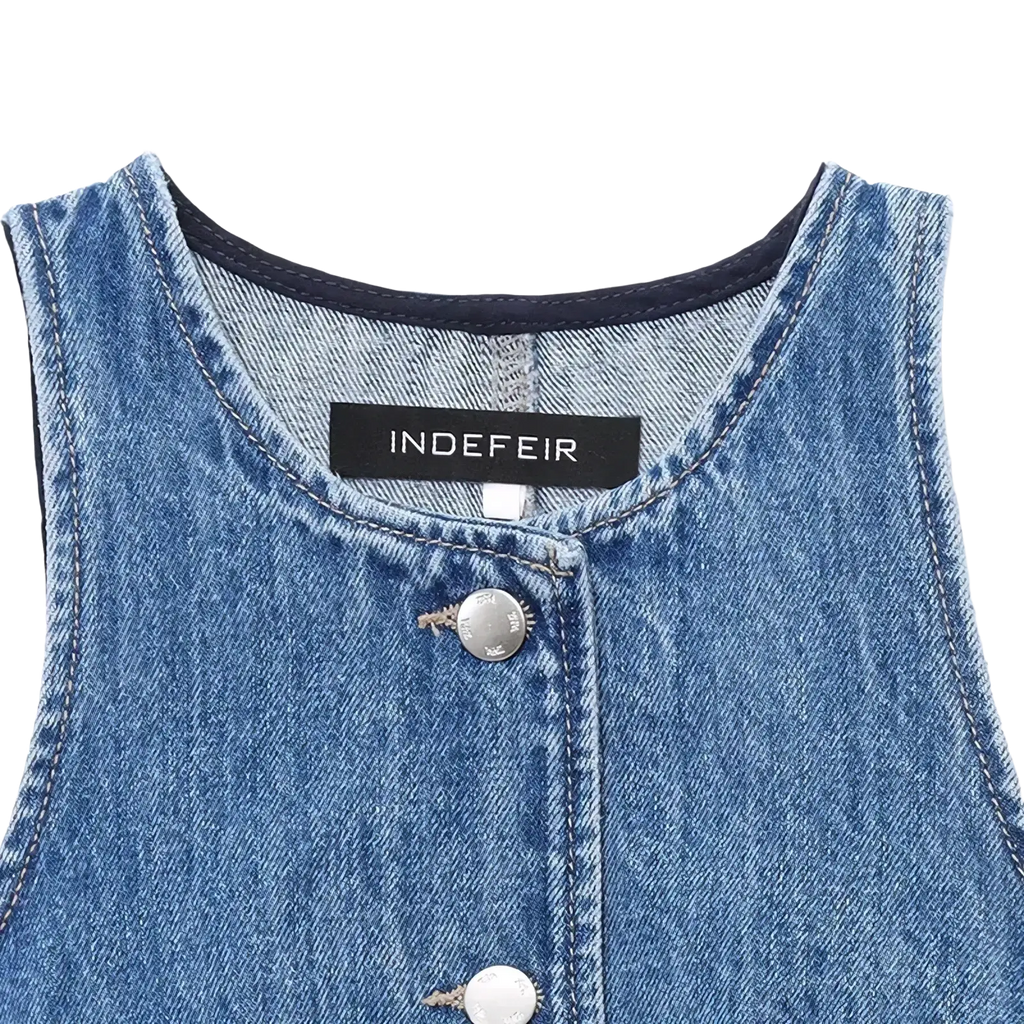 Blue denim sleeveless casual short dress with silver button front and black Indefeir brand tag
