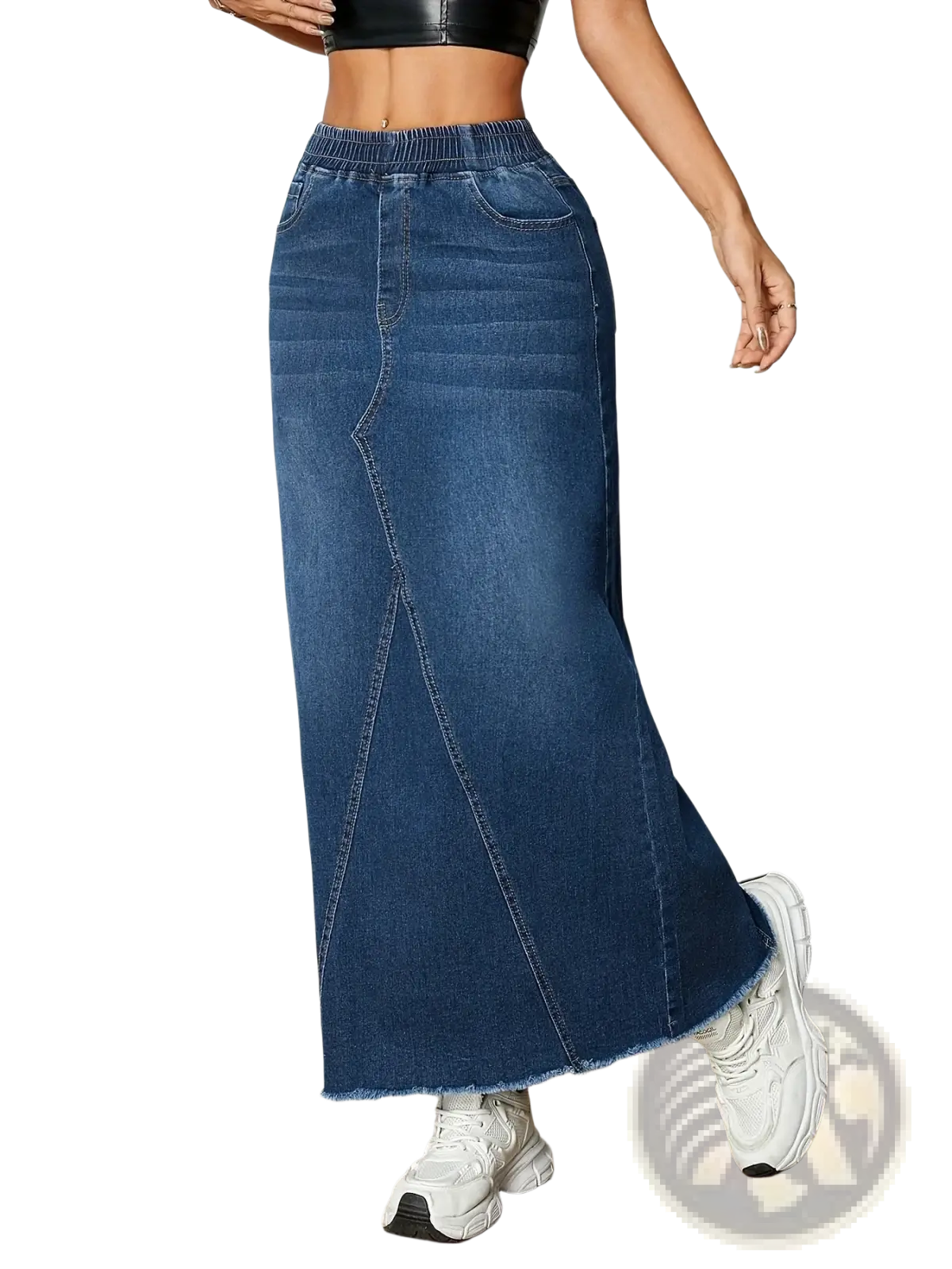 Mid-rise denim skirt with stretchy elastic waist long frayed edges and a flared asymmetrical hem in blue denim