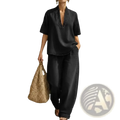 Black denim two piece outfit featuring a v neck loose fitting top and wide leg pants for casual wear