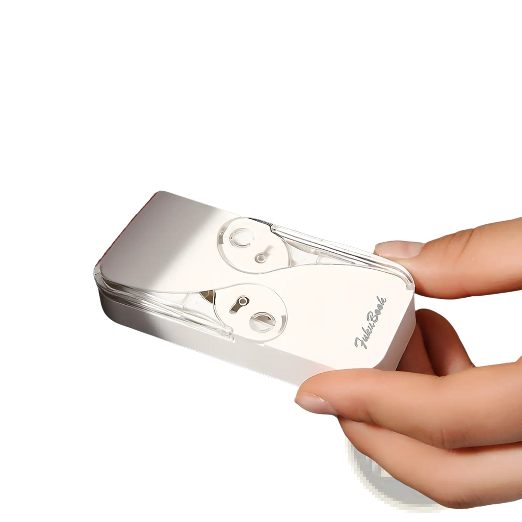 White plastic dental floss storage box with automatic pop up case and clear casing branded fujikura with keyhole design