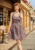 A vibrant sleeveless floral print cotton mini dress with square neckline and fitted waist from Desert Blooms