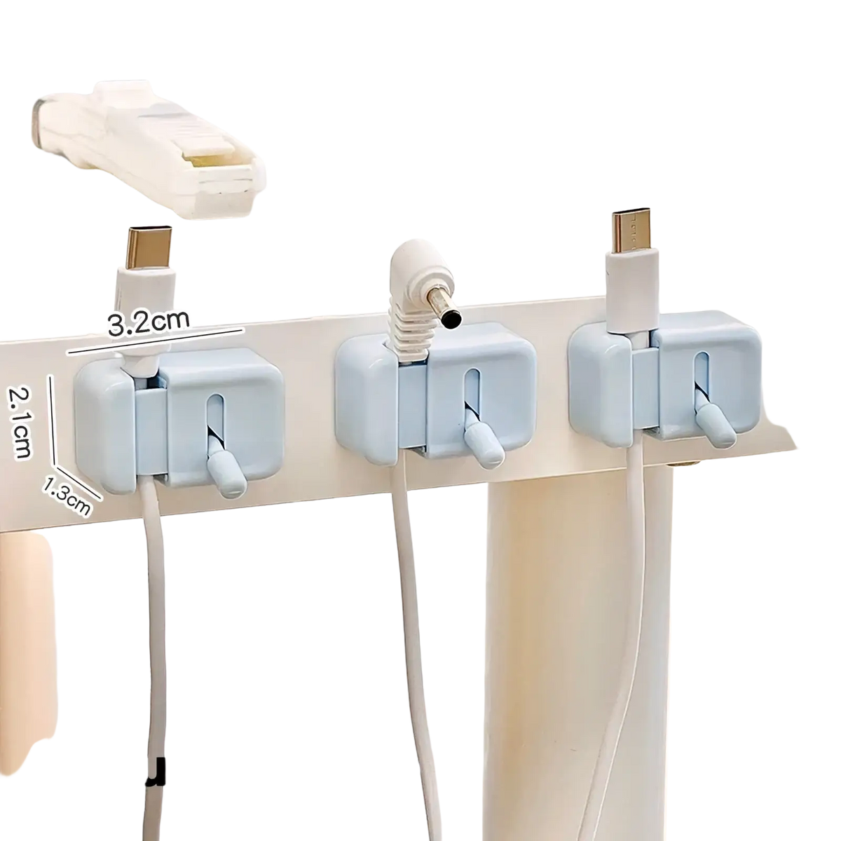 Light blue plastic desk cable clips with small handles for no drill cord organization and neat cable management
