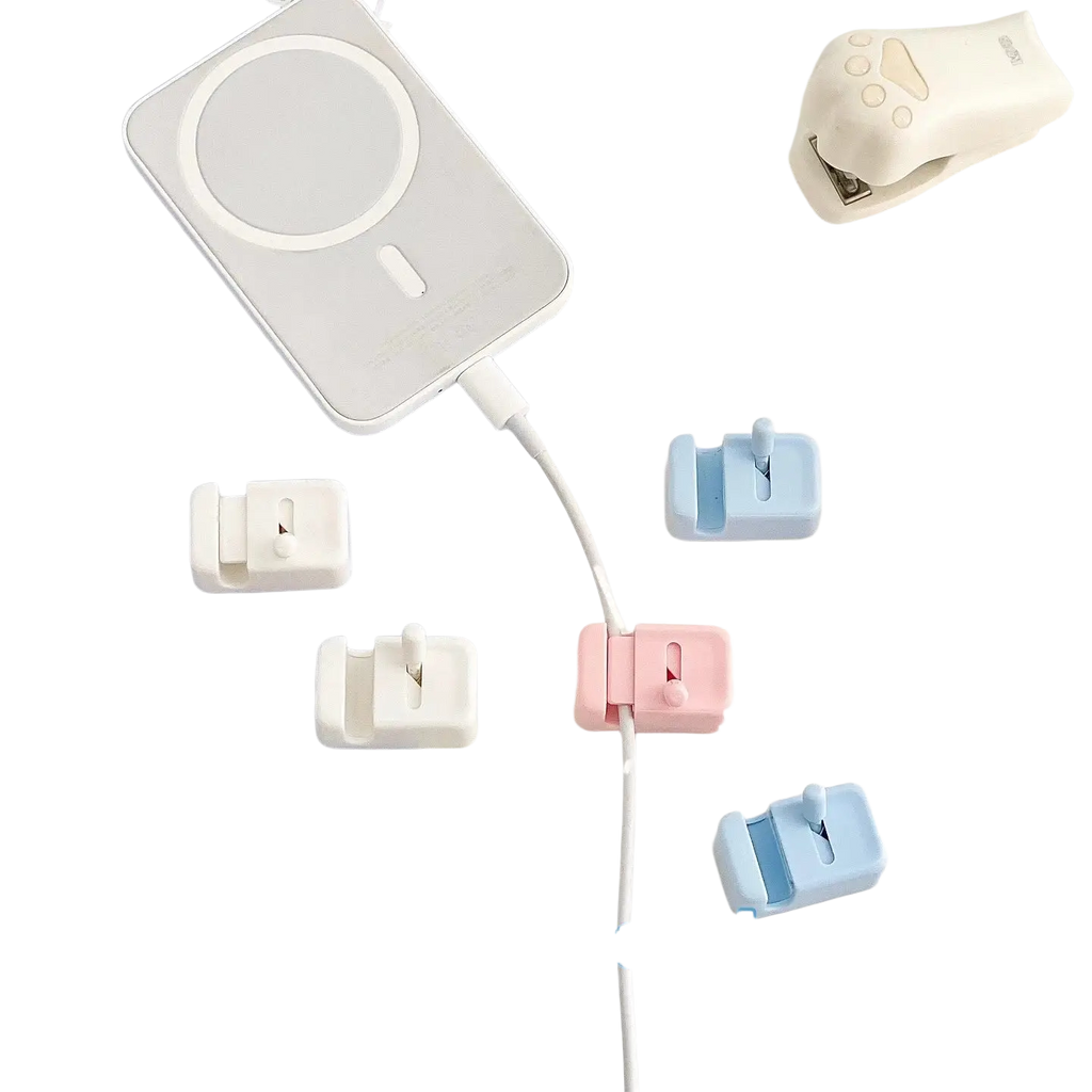 Pastel pink and light blue plastic desk cable clips no drill cord organizers with a minimalist design for cable management