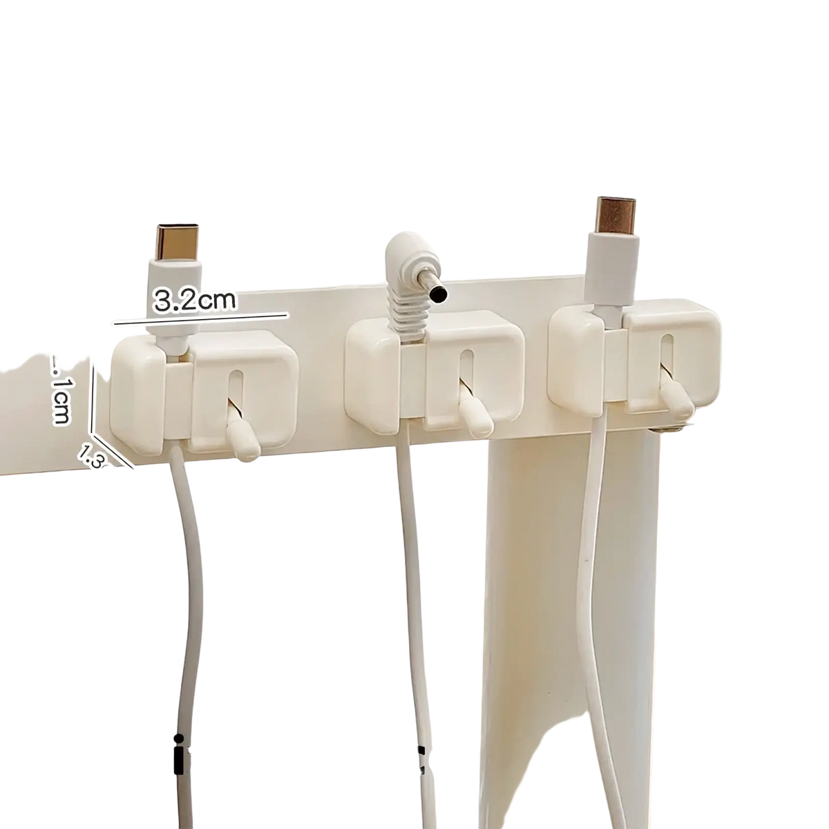 White plastic desk cable clip no drill cord organizer holding different types of charging cords neatly