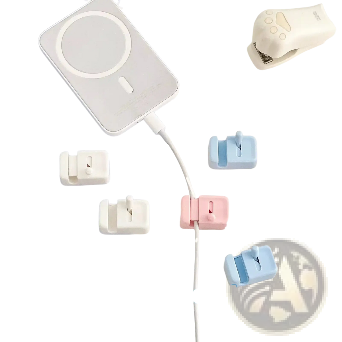 Pastel pink and blue plastic desk cable management clips with minimalist no-drill cord organizer design