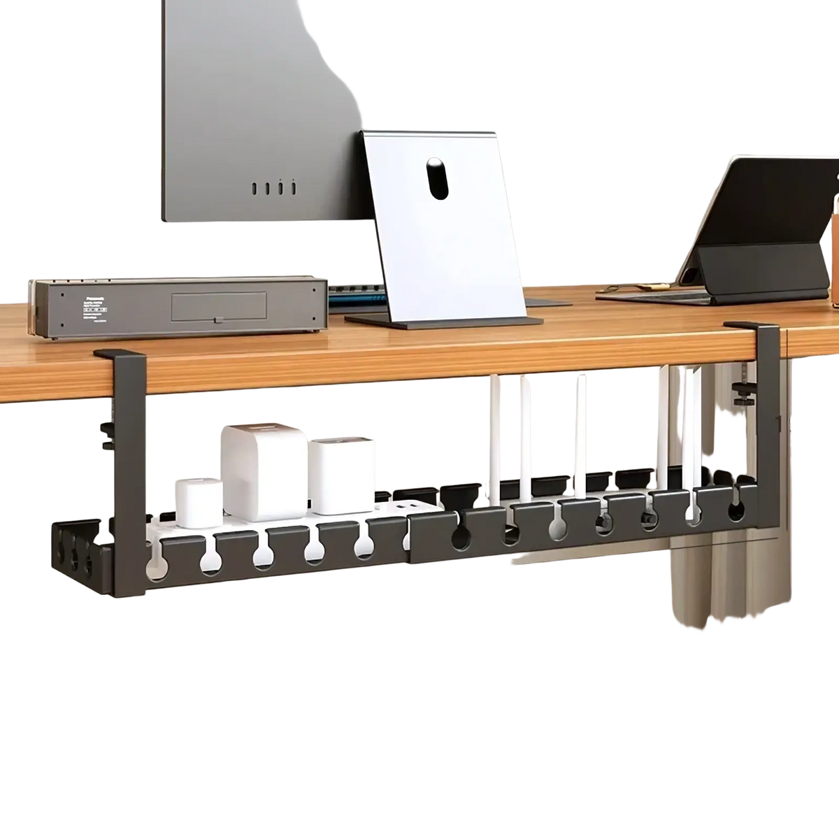 Black metal desk cable management tray with retractable design and multiple slots for organizing cords and devices