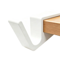 White plastic desk edge bag hook with smooth minimalist design for holding backpacks and bags