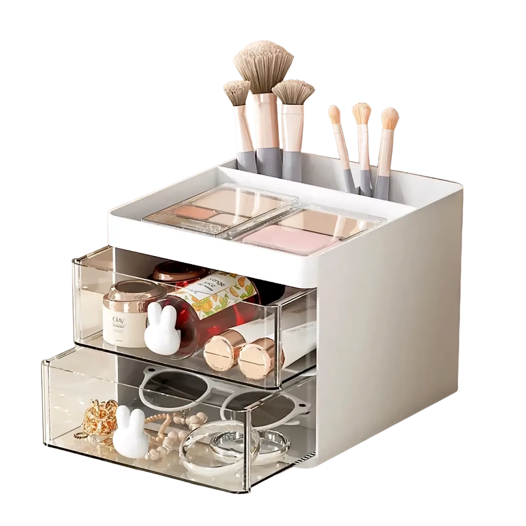 White plastic desk organizer with clear acrylic drawers top compartment holding brushes and palettes with bunny handles