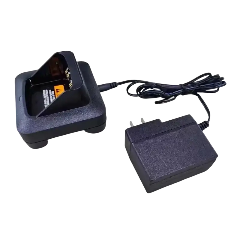 Black plastic desktop base charger with integrated power adapter and coiled cable for motorola xts2500 xts1500 models