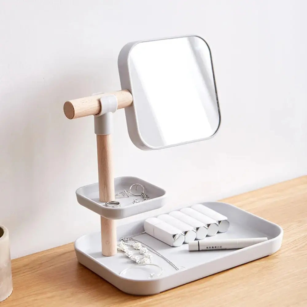 Minimalist cosmetics storage box with adjustable square mirror, light wood handle, and gray plastic two-tiered trays