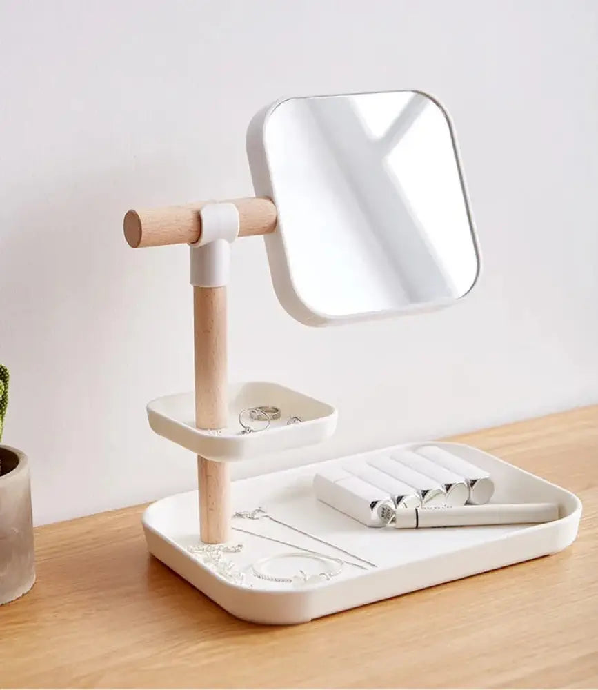 Minimalist cosmetics storage box in white and light wood with an adjustable stand mirror for jewelry organization
