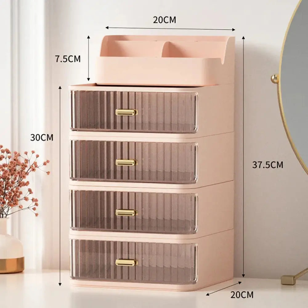 Modern two tiered desktop makeup and jewelry organizer in blush pink plastic with four translucent drawers and gold-tone handles