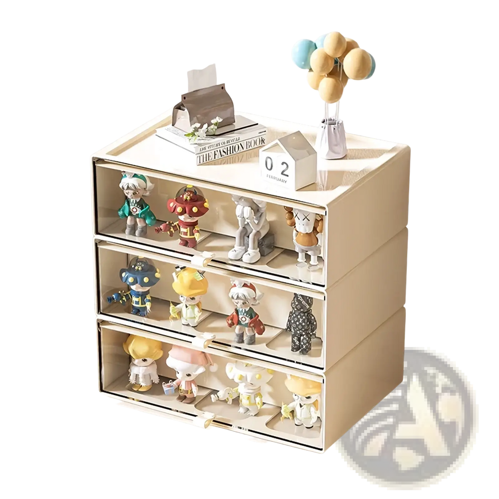 Beige three-drawer desktop organizer with clear fronts and white handles displaying colorful collectible figurines