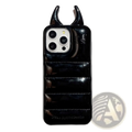 Black glossy devil horn quilted leather iphone case showing back with stitched horizontal segments and protrusions