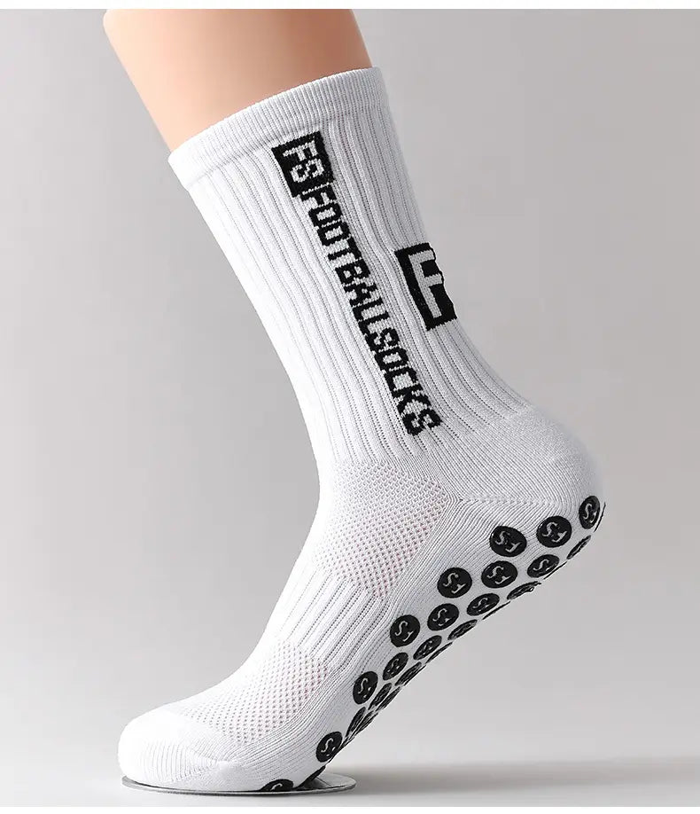 white athletic anti-slip football grip sock for men with black text logo and textured sole grip pattern