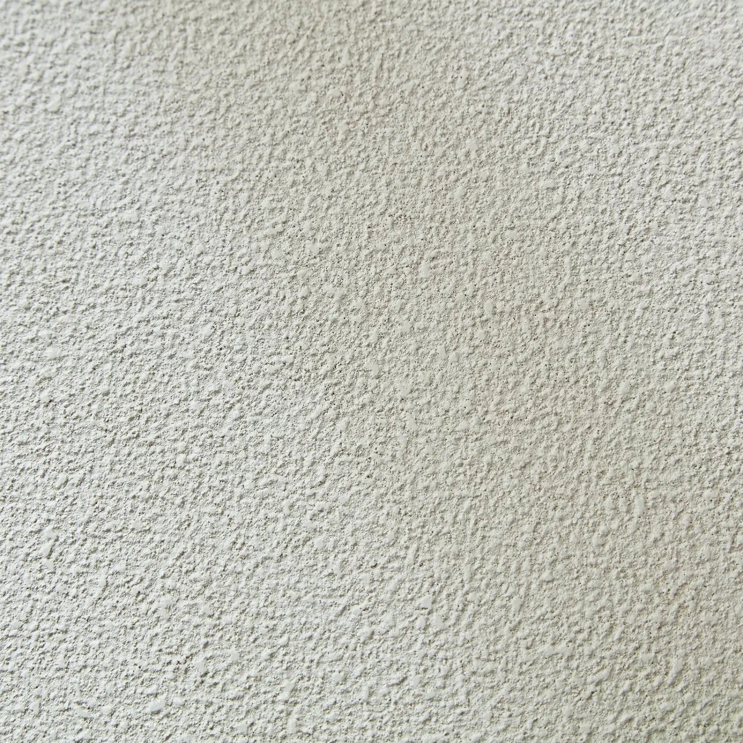 Moderner Akzent-Couchtisch mit strukturierter cremefarbener Off-White-Verputz-Wandoberflächenoptik.