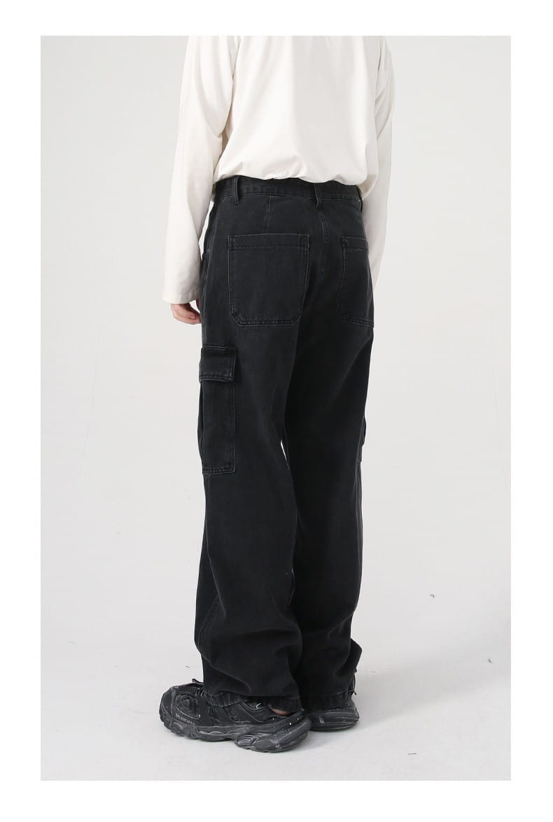 Black loose fit wide leg denim cargo pants featuring multiple pockets and a relaxed fit design.