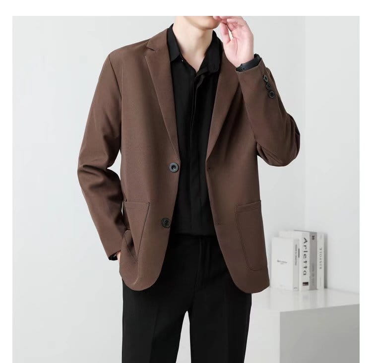 Men slim fit two button blazer in brown with black buttons featuring a sleek modern design.