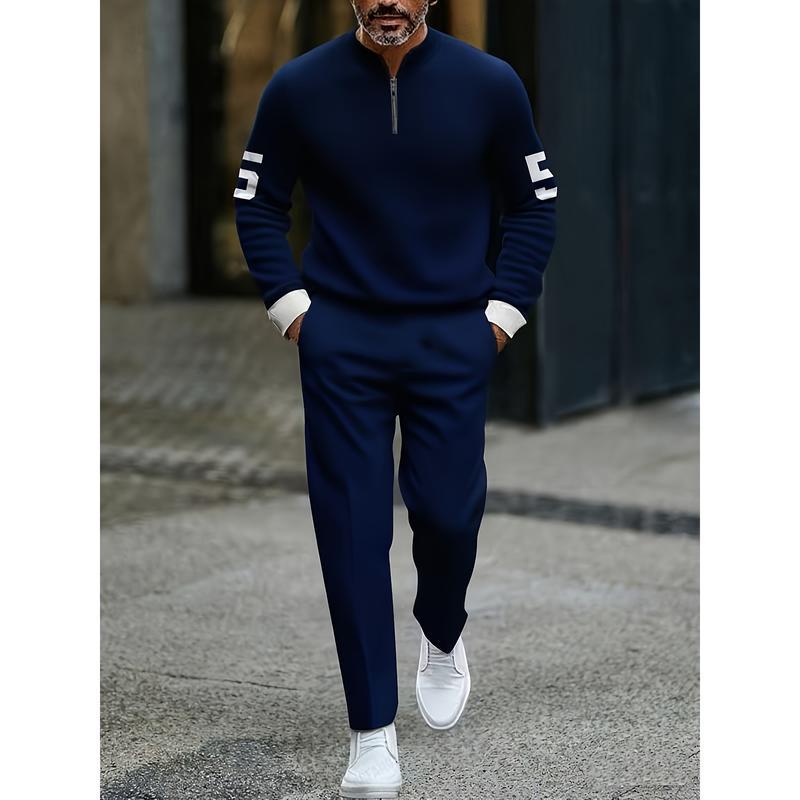 Navy blue knit half zip athletic sweatsuit printed set featuring white number 5 on each sleeve and contrasting white cuffs paired with matching pants.