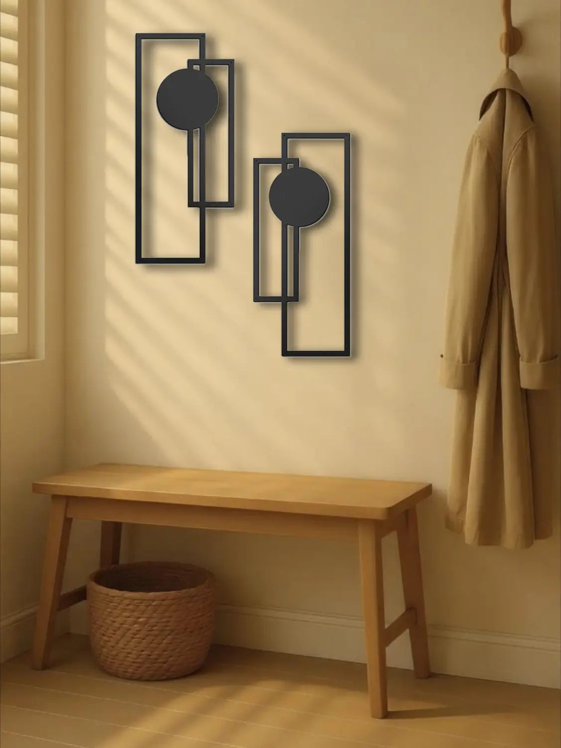 Black metal wall art featuring abstract geometric rectangular frames with circular accents in a two piece set.