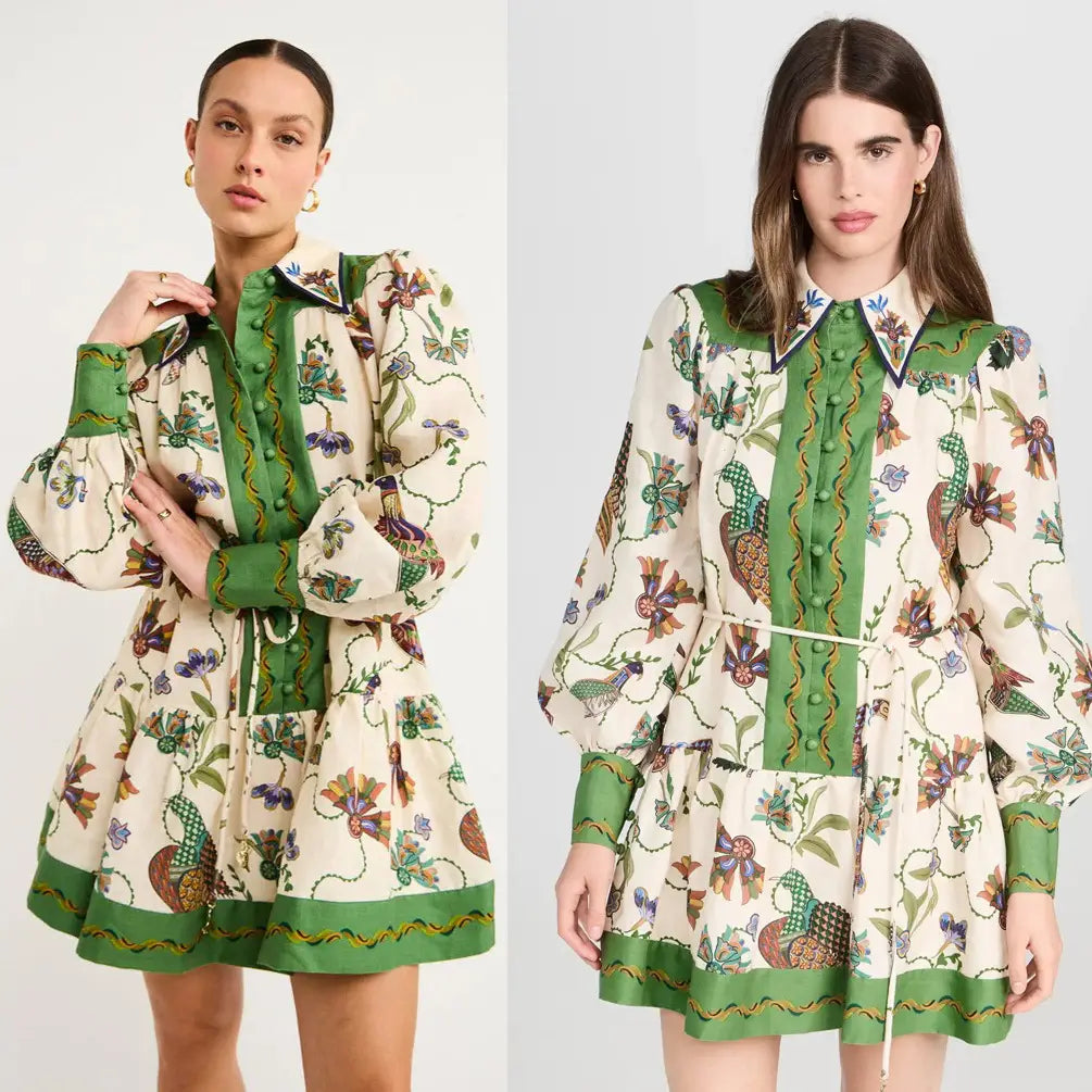 Cream-colored botanical print puff sleeve midi dress with green accents and button-down front featuring contrast trim.