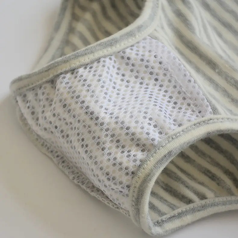 Gray and white striped dog physiological pants with a breathable mesh panel on the front designed as washable pet diaper sanitary shorts.