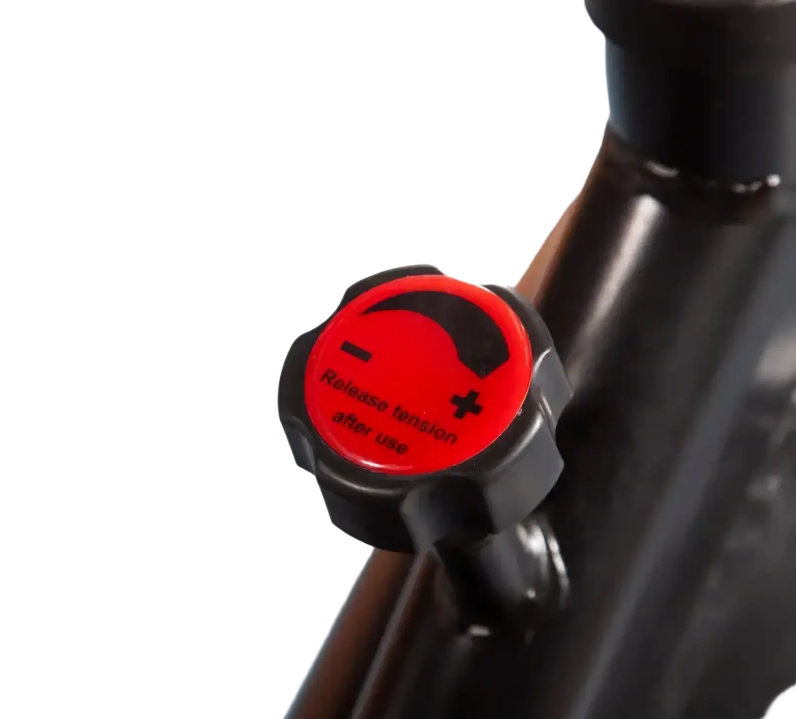Red and black tension adjustment knob with plus and minus symbols on dft fitness indoor spinning exercise bike