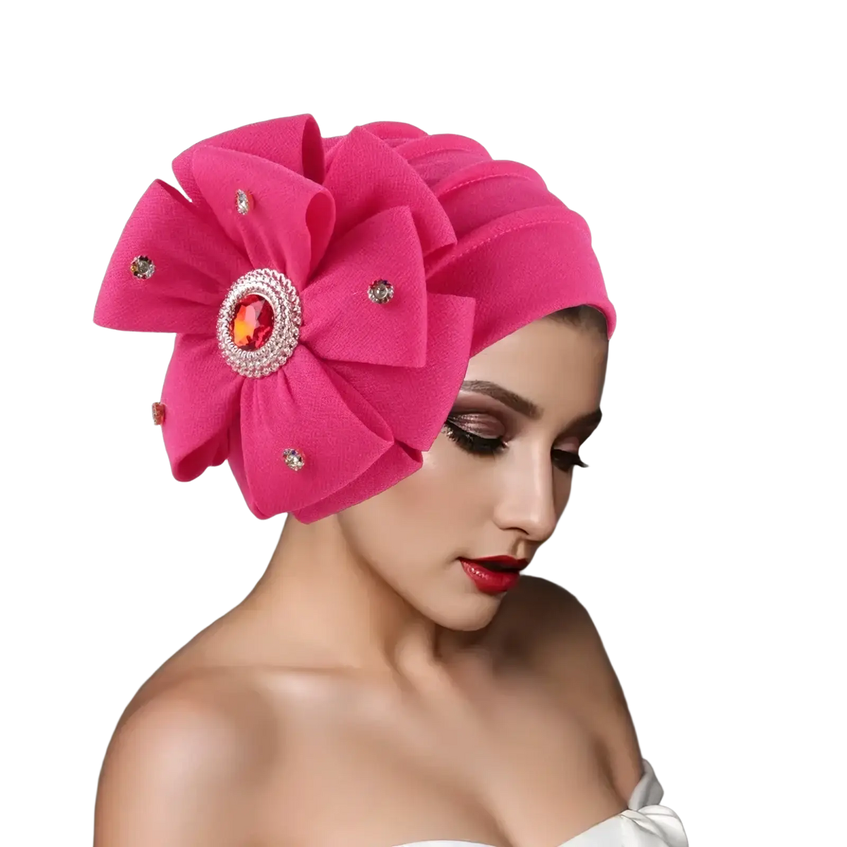 Diamond flower turban cap for women in vibrant fuchsia with a layered fabric flower and ornate gemstone centerpiece