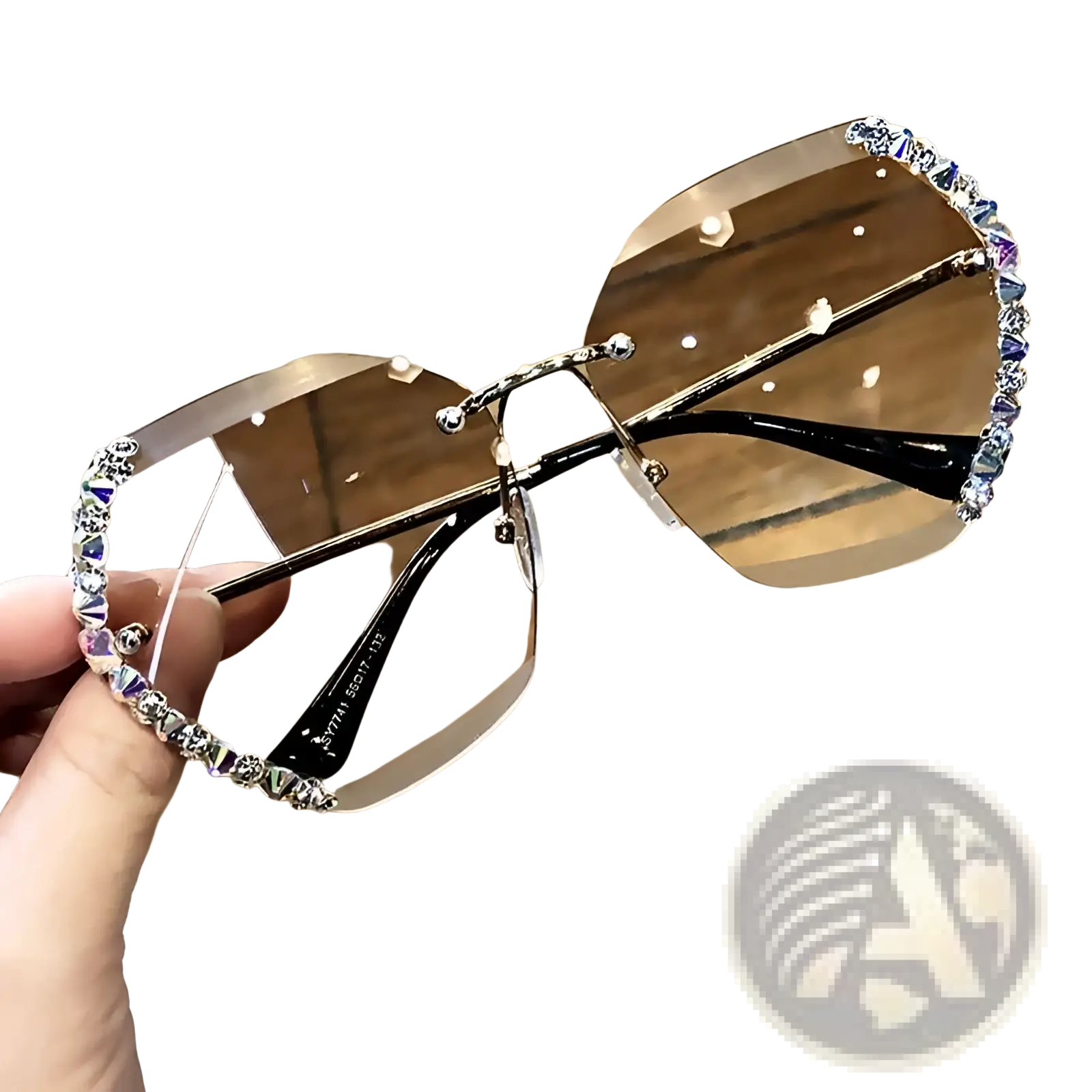 A pair of diamond studded rimless polygonal sunglasses with brown gradient lenses and black metal rhinestone bridge