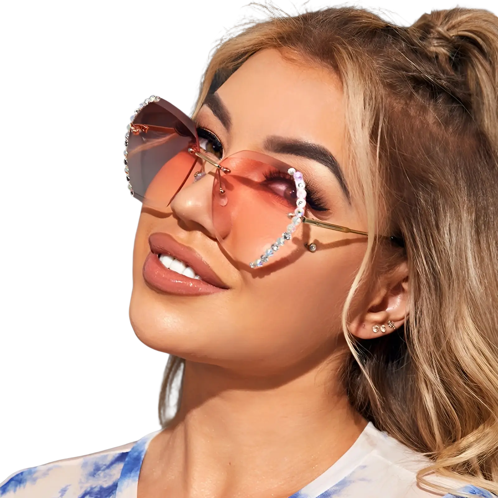 Pink gradient heart-shaped sunglasses with gold frames and diamond studded rhinestone detailing in a polygonal design